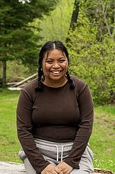 young woman in front of green background